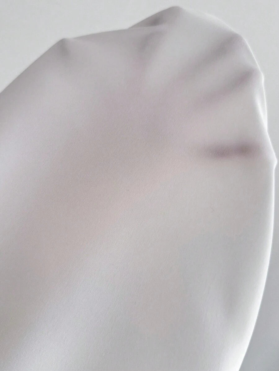 Chemise blanche asymétrique femme Éclégance Sculptée vue tissu 100% polyesters Gilles de Beaumont