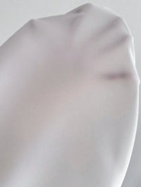 Chemise blanche asymétrique femme Éclégance Sculptée vue tissu 100% polyesters Gilles de Beaumont